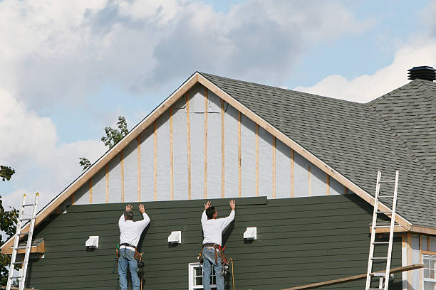 Professional Siding Replacement technician working in Bruington, VA